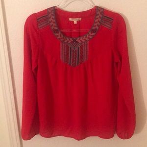 Red blouse with Aztec print